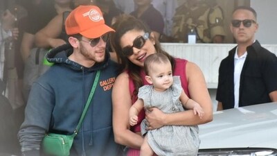 Priyanka Chopra, Nick Jonas with daughter Malti Marie Chopra Jonas at Mumbai airport. Priyanka Chopra, Nick Jonas with daughter Malti Marie Chopra Jonas at Mumbai airport.