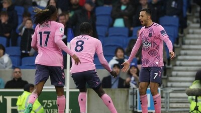 Everton's Dwight McNeil celebrates scoring their fifth goal with Alex Iwobi and Amadou Onana (REUTERS)