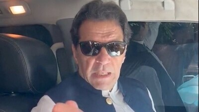 Former Pakistan Prime Minister Imran Khan gestures in a video statement, at an unknown location in Pakistan, in this screen grab obtained from a social media video. (Twitter / Imran Khan)
