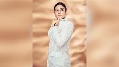 Raveena styled her hair into a sleek low bun to complete her sophisticated look. (Instagram/@officialraveenatandon)