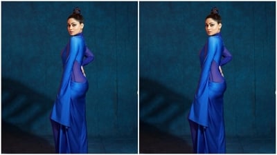 Shamita looked every bit gorgeous in the blue see-through mesh details cascading to bodycon pants, teamed with wrap details in blue silk attire, with a full sleeve. (Instagram/@shamitashetty_official) Shamita looked every bit gorgeous in the blue see-through mesh details cascading to bodycon pants, teamed with wrap details in blue silk attire, with a full sleeve. (Instagram/@shamitashetty_official)