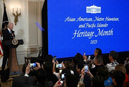 US President Joe Biden hosts a screening of 'American Born Chinese' in celebration of Asian American, Native Hawaiian, and Pacific Islander Heritage Month, in the East Room of the White House in Washington, DC. (AFP) US President Joe Biden hosts a screening of 'American Born Chinese' in celebration of Asian American, Native Hawaiian, and Pacific Islander Heritage Month, in the East Room of the White House in Washington, DC. (AFP)