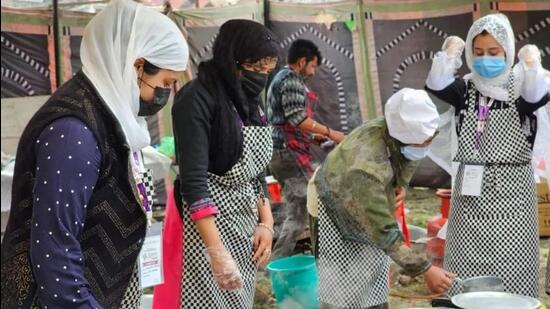 Members of the first women-only “waza”, or chef group, from Kashmir preparing the traditional meal. (HT Photo)