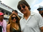 US actor Tom Cruise (R) and Colombian singer Shakira (L) attend the 2023 Miami Formula One Grand Prix at the Miami International Autodrome in Miami Gardens, Florida, on May 7, 2023.