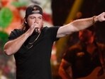 Morgan Wallen performs on the first night of the 2022 iHeartRadio Music Festival, on Sept. 23, 2022, in Las Vegas. Thousands of country music fans were awaiting the singer when he suddenly canceled his performance Sunday night, April 23, 2023, at Vaught Hemingway Stadium. WTVA-TV reported that video boards inside the Ole Miss football stadium showed a message that said the singer had lost his voice and was unable to perform, adding that people would be refunded their money where they bought their tickets. (AP Photo/John Locher, File) Morgan Wallen performs on the first night of the 2022 iHeartRadio Music Festival, on Sept. 23, 2022, in Las Vegas. Thousands of country music fans were awaiting the singer when he suddenly canceled his performance Sunday night, April 23, 2023, at Vaught Hemingway Stadium. WTVA-TV reported that video boards inside the Ole Miss football stadium showed a message that said the singer had lost his voice and was unable to perform, adding that people would be refunded their money where they bought their tickets. (AP Photo/John Locher, File)
