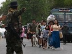 Meitei refugees arrive to board a paramilitary truck at a transit point after being evacuated from the violence that hit Churachandpur, near Imphal in the northeastern Indian state of Manipur. Meitei refugees arrive to board a paramilitary truck at a transit point after being evacuated from the violence that hit Churachandpur, near Imphal in the northeastern Indian state of Manipur.