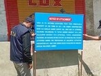 NIA (National Investigation Agency) attaches properties of three accused, involved in terror cases at Shopian, Lethpora and Kupwara, on Wednesday.
