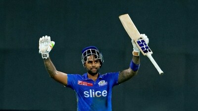 Mumbai Indians' Suryakumar Yadav raises his bat after completing his fifty in a match against Royal Challengers Bangalore during the Indian Premier League 2023, at Wankhede Stadium (IPL Twitter) Mumbai Indians' Suryakumar Yadav raises his bat after completing his fifty in a match against Royal Challengers Bangalore during the Indian Premier League 2023, at Wankhede Stadium (IPL Twitter)