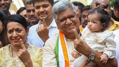 Former Karnataka Chief Minister and Congress candidate from Hubli-Dharwad-Central, Jagadish Shettar and his wife Shilpa Shettar show their ink-marked fingers after casting their votes for the Karnataka assembly elections, at the polling booth number 122, in Hubli. (ANI) Former Karnataka Chief Minister and Congress candidate from Hubli-Dharwad-Central, Jagadish Shettar and his wife Shilpa Shettar show their ink-marked fingers after casting their votes for the Karnataka assembly elections, at the polling booth number 122, in Hubli. (ANI)