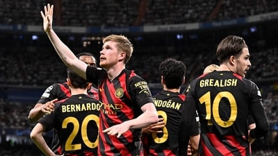 Manchester City's Belgian midfielder Kevin De Bruyne (L) celebrates scoring his team's first goal during the UEFA Champions League semi-final first leg football match between Real Madrid CF and Manchester City at the Santiago Bernabeu stadium (AFP) Manchester City's Belgian midfielder Kevin De Bruyne (L) celebrates scoring his team's first goal during the UEFA Champions League semi-final first leg football match between Real Madrid CF and Manchester City at the Santiago Bernabeu stadium (AFP)