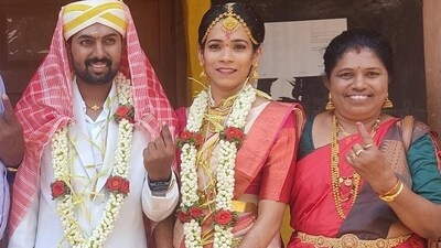 Bride and groom along with their family cast their votes for Karnataka Assembly Election 2023 at a polling booth in Mysuru. (ANI) Bride and groom along with their family cast their votes for Karnataka Assembly Election 2023 at a polling booth in Mysuru. (ANI)