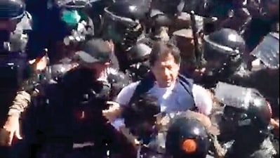 Imran Khan was surrounded by security personnel and dragged out of the court. Imran Khan was surrounded by security personnel and dragged out of the court.