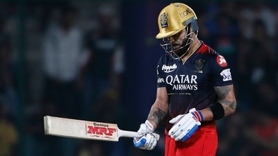 Royal Challengers Bangalore's Virat Kohli reacts after losing his wicket (AP) Royal Challengers Bangalore's Virat Kohli reacts after losing his wicket (AP)