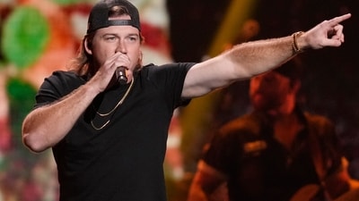 Morgan Wallen performs on the first night of the 2022 iHeartRadio Music Festival, on Sept. 23, 2022, in Las Vegas. Thousands of country music fans were awaiting the singer when he suddenly canceled his performance Sunday night, April 23, 2023, at Vaught Hemingway Stadium. WTVA-TV reported that video boards inside the Ole Miss football stadium showed a message that said the singer had lost his voice and was unable to perform, adding that people would be refunded their money where they bought their tickets. (AP Photo/John Locher, File) (AP) Morgan Wallen performs on the first night of the 2022 iHeartRadio Music Festival, on Sept. 23, 2022, in Las Vegas. Thousands of country music fans were awaiting the singer when he suddenly canceled his performance Sunday night, April 23, 2023, at Vaught Hemingway Stadium. WTVA-TV reported that video boards inside the Ole Miss football stadium showed a message that said the singer had lost his voice and was unable to perform, adding that people would be refunded their money where they bought their tickets. (AP Photo/John Locher, File) (AP)