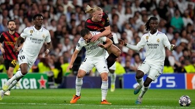 Manchester City's Erling Haaland, top center, is challenged by Real Madrid's Nacho during the Champions League semifinal first leg soccer match between Real Madrid and Manchester City at the Santiago Bernabeu stadium in Madrid, Spain, Tuesday, May 9, 2023. (AP Photo/Manu Fernandez) (AP) Manchester City's Erling Haaland, top center, is challenged by Real Madrid's Nacho during the Champions League semifinal first leg soccer match between Real Madrid and Manchester City at the Santiago Bernabeu stadium in Madrid, Spain, Tuesday, May 9, 2023. (AP Photo/Manu Fernandez) (AP)