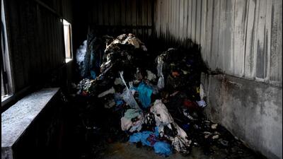 The fire started in a three-by-four-foot tin shed built on the factory’s terrace to store scrap fabric. Because the fabric scraps kept nearby were of flammable material, the pile caught fire immediately. (Sunil Ghosh/HT Photo) The fire started in a three-by-four-foot tin shed built on the factory’s terrace to store scrap fabric. Because the fabric scraps kept nearby were of flammable material, the pile caught fire immediately. (Sunil Ghosh/HT Photo)