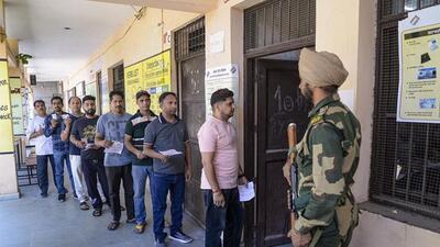 Voters waiting in queue at a polling station to exercise their franchise in the Lok Sabha byelection in Jalandhar on Wednesday. (PTI Photo) Voters waiting in queue at a polling station to exercise their franchise in the Lok Sabha byelection in Jalandhar on Wednesday. (PTI Photo)