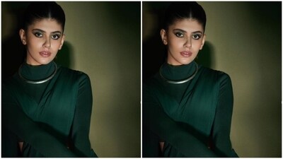 Sanjana, abiding by the awards’ mandate of showing up in the rendition of street couture, looked ravishing in the teal velvet saree gown with full sleeves cascading to gloves, turtle-neck details and a long pallu. (Instagram/@sanjanasanghi96) Sanjana, abiding by the awards’ mandate of showing up in the rendition of street couture, looked ravishing in the teal velvet saree gown with full sleeves cascading to gloves, turtle-neck details and a long pallu. (Instagram/@sanjanasanghi96)