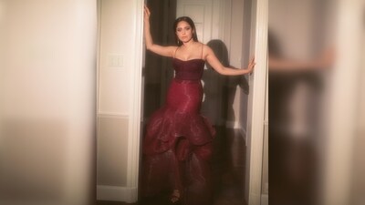 Nushrratt Bharuccha's outfit features a plunging neckline strappy corset-inspired top and a layered metallic skirt. (Instagram/@nushrrattbharuccha) Nushrratt Bharuccha's outfit features a plunging neckline strappy corset-inspired top and a layered metallic skirt. (Instagram/@nushrrattbharuccha)