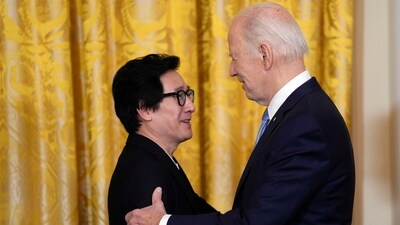 President Joe Biden shakes hands with actor Ke Huy Quan before a screening of the series "American Born Chinese" in the East Room of the White House in Washington. The screening was being held in celebration of Asian American, Native Hawaiian, and Pacific Islander Heritage Month, Monday, May 8, 2023. (AP) President Joe Biden shakes hands with actor Ke Huy Quan before a screening of the series "American Born Chinese" in the East Room of the White House in Washington. The screening was being held in celebration of Asian American, Native Hawaiian, and Pacific Islander Heritage Month, Monday, May 8, 2023. (AP)