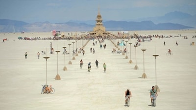 Burning Man, Black Rock City, Nevada: This annual festival takes place in the Black Rock Desert of Nevada, USA. It is a week-long gathering that attracts tens of thousands of people from all over the world. Their aim is to encourage radical self-expression, communal participation, and a temporary sense of community. (AP) Burning Man, Black Rock City, Nevada: This annual festival takes place in the Black Rock Desert of Nevada, USA. It is a week-long gathering that attracts tens of thousands of people from all over the world. Their aim is to encourage radical self-expression, communal participation, and a temporary sense of community. (AP)