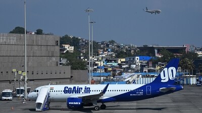 A Go First airline aircraft, formerly known as GoAir, is seen parked at the apron of the Mumbai International airport on May 3, 2023. (AFP) A Go First airline aircraft, formerly known as GoAir, is seen parked at the apron of the Mumbai International airport on May 3, 2023. (AFP)