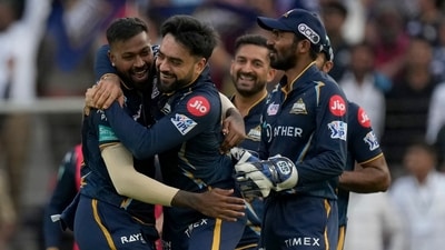 Gujarat Titans' Rashid Khan, second left, celebrates with teammates after taking the catch to dismiss Lucknow Super Giants' Kyle Mayers during the Indian Premier League cricket match between Gujarat Titans and Lucknow Super Giants in Ahmedabad, India, Wednesday, May 7, 2023. (AP Photo/Ajit Solanki) (AP) Gujarat Titans' Rashid Khan, second left, celebrates with teammates after taking the catch to dismiss Lucknow Super Giants' Kyle Mayers during the Indian Premier League cricket match between Gujarat Titans and Lucknow Super Giants in Ahmedabad, India, Wednesday, May 7, 2023. (AP Photo/Ajit Solanki) (AP)
