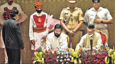 Mumbai, India - June 30, 2022: Shiv Sena rebel leader Eknath Shinde takes oath as Chief Minister of Maharashtra while BJP leader Devendra Fadnavis sworn in as the Deputy Chief Minister of Maharashtra in the presence of the Governor Bhagat Singh Koshyari at Raj Bhavan, in Mumbai, India, on Thursday, June 30, 2022. (Photo by Satish Bate/Hindustan Times) (Satish Bate/HT PHOTO) Mumbai, India - June 30, 2022: Shiv Sena rebel leader Eknath Shinde takes oath as Chief Minister of Maharashtra while BJP leader Devendra Fadnavis sworn in as the Deputy Chief Minister of Maharashtra in the presence of the Governor Bhagat Singh Koshyari at Raj Bhavan, in Mumbai, India, on Thursday, June 30, 2022. (Photo by Satish Bate/Hindustan Times) (Satish Bate/HT PHOTO)