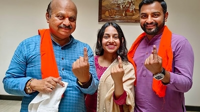 Chief Minister Basavaraj Bommai with his family after casting vote for Karnataka Assembly elections, in Shiggaon on Wednesday. (PTI)