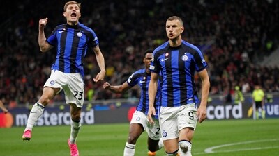 Champions League - Semi Final - First Leg - AC Milan v Inter Milan - Inter Milan's Edin Dzeko celebrates scoring their first goal with Nicolo Barella and Denzel Dumfries (REUTERS)