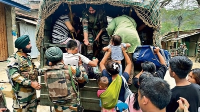 Security personnel during a rescue operation in Manipur on Sunday. (ANI) Security personnel during a rescue operation in Manipur on Sunday. (ANI)
