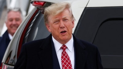FILE PHOTO: Former U.S. President and Republican presidential candidate Donald Trump reacts after arriving at Aberdeen International Airport (REUTERS)
