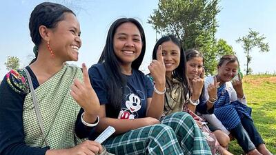 Women voters show their ink-marked fingers after casting their votes for the Sohiong Assembly by-poll. (ANI photo)