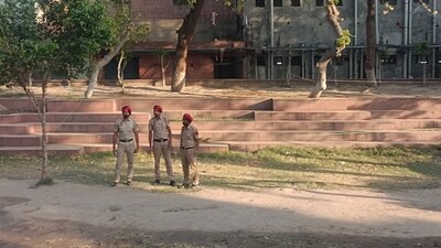Punjab police personnel stand guard near the blast site at Galiara near Shri Guru Ram Das Sarai of the Golden Temple in Amritsar on Thursday. (Sameer Sehgal/Hindustan Times) Punjab police personnel stand guard near the blast site at Galiara near Shri Guru Ram Das Sarai of the Golden Temple in Amritsar on Thursday. (Sameer Sehgal/Hindustan Times)