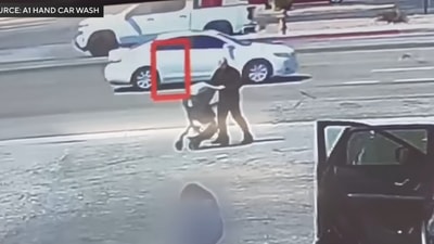 Screengrab of viral video showing Ron Nessman rescuing the baby.