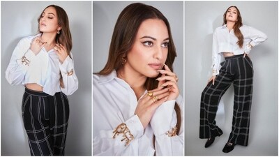 Sonakshi Sinha is known for her stunning looks and impeccable fashion sense. She has the ability to slay any outfit, whether it's a saree or a pantsuit. Her Instagram posts are a treat for fashion enthusiasts, and her latest look is no exception. Recently, she donned a chic trouser and crop shirt that left her fans in awe. (Instagram/@aslisona) Sonakshi Sinha is known for her stunning looks and impeccable fashion sense. She has the ability to slay any outfit, whether it's a saree or a pantsuit. Her Instagram posts are a treat for fashion enthusiasts, and her latest look is no exception. Recently, she donned a chic trouser and crop shirt that left her fans in awe. (Instagram/@aslisona)