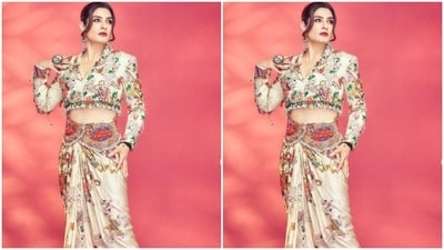 The skirt came decorated in a multicoloured embellishment at the waist. In nude stilettos from Lodi Shoes, Raveena completed her look. (Instagram/@officialraveenatandon) The skirt came decorated in a multicoloured embellishment at the waist. In nude stilettos from Lodi Shoes, Raveena completed her look. (Instagram/@officialraveenatandon)