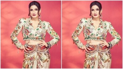 Raveena further accessorised her look for the day in statement golden earrings, a statement silver oxidised finger ring and a bracelet from the house of My Motifs. (Instagram/@officialraveenatandon) Raveena further accessorised her look for the day in statement golden earrings, a statement silver oxidised finger ring and a bracelet from the house of My Motifs. (Instagram/@officialraveenatandon)