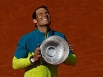 Spain's Rafael Nadal celebrates with trophy after winning the men's singles final against Norway's Casper Ruud 