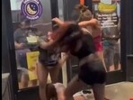 Screen-grab from the video showing a group of women in a brawl.