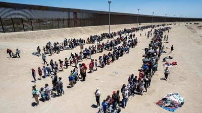 Migrants line up to be processed to make asylum claims at a makeshift migrant camp in El Paso, Texas. While Title 42 prevented many from seeking asylum, it carried no legal consequences, encouraging repeat attempts. After Thursday, migrants face being barred from entering the U.S. for five years and possible criminal prosecution, reported AP (John Moore / Getty Images / AFP ) Migrants line up to be processed to make asylum claims at a makeshift migrant camp in El Paso, Texas. While Title 42 prevented many from seeking asylum, it carried no legal consequences, encouraging repeat attempts. After Thursday, migrants face being barred from entering the U.S. for five years and possible criminal prosecution, reported AP (John Moore / Getty Images / AFP )