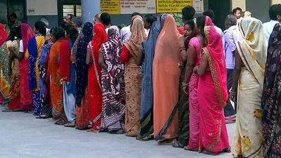 Azamgarh, May 11 (ANI): Women voters stand in a queue at a polling booth for the second phase of Uttar Pradesh urban local body polls, in Azamgarh on Thursday. (ANI Photo) Azamgarh, May 11 (ANI): Women voters stand in a queue at a polling booth for the second phase of Uttar Pradesh urban local body polls, in Azamgarh on Thursday. (ANI Photo)