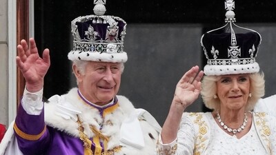 Britain's King Charles III and Queen Camilla wave to the crowds from the balcony of Buckingham Palace. (AP) Britain's King Charles III and Queen Camilla wave to the crowds from the balcony of Buckingham Palace. (AP)