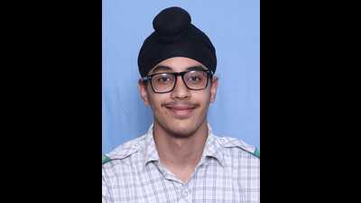 Asees Jot Singh of Bhavan Vidyalaya, Panchkula, scored an impressive 99.8% marks to top in Chandigarh tricity. (HT)