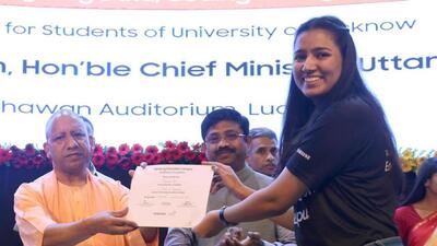 Chief minister Yogi Adityanath handing over a certificate to a participant in an innovation campus programme, in Lucknow on Friday. (HT Photo)