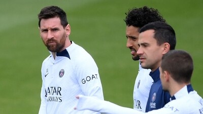 Paris Saint-Germain's Argentine forward Lionel Messi (L) looks on during a training session in Saint-Germain-en-Laye (AFP) Paris Saint-Germain's Argentine forward Lionel Messi (L) looks on during a training session in Saint-Germain-en-Laye (AFP)