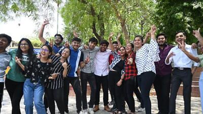 Gurugram, India-May 12, 2023: Students celebrate their success after announced the Central Board of Secondary Education (CBSE) class 12th result in Blue Bells Model School, Sector-4 near Ram Mandir, in Gurugram, India, on Friday, 12 May 2023. (Photo by Parveen Kumar/Hindustan Times) Gurugram, India-May 12, 2023: Students celebrate their success after announced the Central Board of Secondary Education (CBSE) class 12th result in Blue Bells Model School, Sector-4 near Ram Mandir, in Gurugram, India, on Friday, 12 May 2023. (Photo by Parveen Kumar/Hindustan Times)