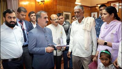 Himachal Pradesh chief minister Sukhvinder Singh Sukhu listens to the grievances of people in Shimla on Friday. (HT)