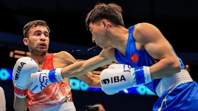 **EDS: IMAGE VIA BFI** Tashkent: India's Deepak Bhoria (red) during his 51kg quarter-final match against Diushebaev Nurzhigit of Kyrgyzstan, at the IBA Men�s World Boxing Championships in Tashkent, Uzbekistan, Wednesday, May 10, 2023. (PTI Photo)(PTI05_10_2023_000225B) (PTI) **EDS: IMAGE VIA BFI** Tashkent: India's Deepak Bhoria (red) during his 51kg quarter-final match against Diushebaev Nurzhigit of Kyrgyzstan, at the IBA Men�s World Boxing Championships in Tashkent, Uzbekistan, Wednesday, May 10, 2023. (PTI Photo)(PTI05_10_2023_000225B) (PTI)