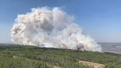 In this photo provided by the Government of Alberta Fire Service, a wildfire burns a section of forest in the Grande Prairie district of Alberta, Canada. (AP) In this photo provided by the Government of Alberta Fire Service, a wildfire burns a section of forest in the Grande Prairie district of Alberta, Canada. (AP)